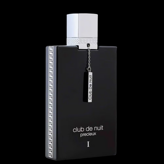 Imagen del perfume Armaf Club de Nuit Précieux I Extrait de Parfum, frasco elegante con diseño dorado y tapa negra, fragancia unisex con notas de piña, caramelo, jazmín y ámbar, disponible en Costa Rica en decants y presentación completa.