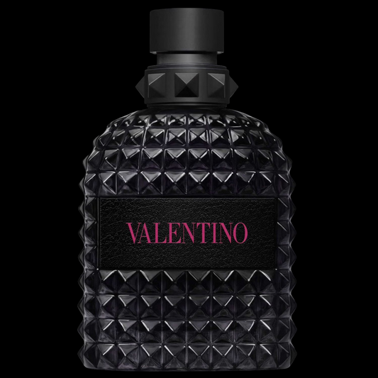 Imagen del perfume Valentino Born in Roma Uomo Extradose EDP, frasco negro con textura rock-stud y detalles metálicos, fragancia masculina ambarada y especiada con vainilla y cardamomo, disponible en Costa Rica en decants y presentación completa.
