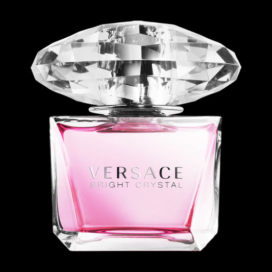 Imagen del perfume Versace Bright Crystal Eau de Toilette para mujer, frasco rosado elegante con tapa transparente tipo diamante, fragancia floral frutal fresca con yuzu y granada, corazón de peonía, flor de loto y magnolia, y fondo de almizcle, caoba y ámbar, disponible en Costa Rica en decants y presentación completa.