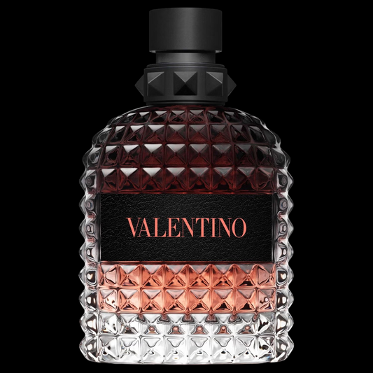 Imagen del perfume Valentino Born In Roma Uomo Coral Fantasy 100 ml para hombre, frasco naranja coral con detalles negros, fragancia frutal y amaderada con manzana roja y tabaco, disponible en Costa Rica.