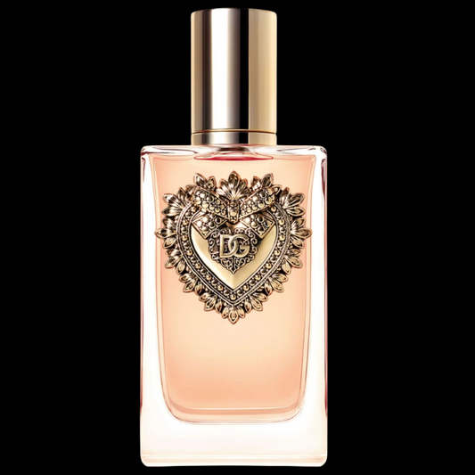 Imagen del perfume Dolce & Gabbana Devotion EDP para mujer, frasco dorado rectangular con tapa ornamentada en forma de corazón barroco, fragancia femenina cítrica gourmand con mandarina y vainilla, disponible en Costa Rica en decants y presentación completa.