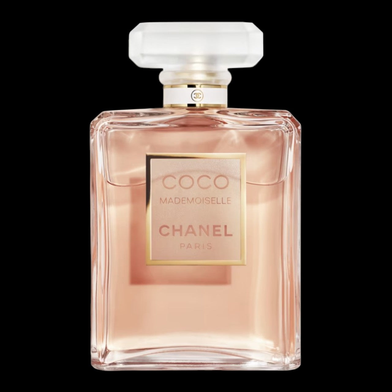 Imagen del perfume Chanel Coco Mademoiselle EDP para mujer, frasco rectangular transparente con líquido rosado y tapa blanca con aro dorado, fragancia femenina cítrica y floral con rosa y pachulí, disponible en Costa Rica en decants y presentación completa.
